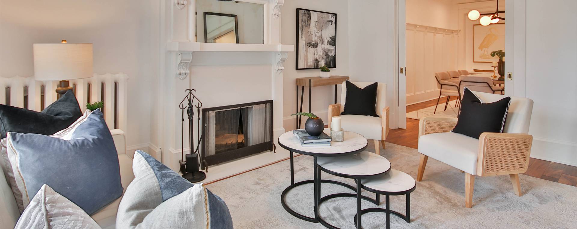 Lounge room with cream carpet and cream armchairs
