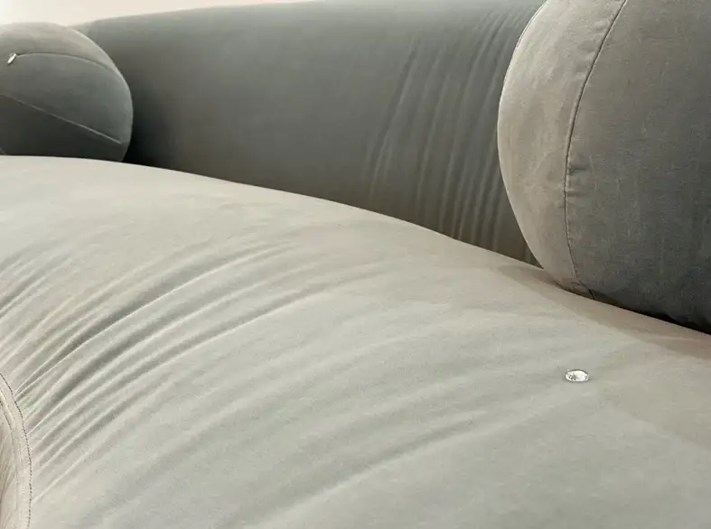 Grey sofa with water molecule